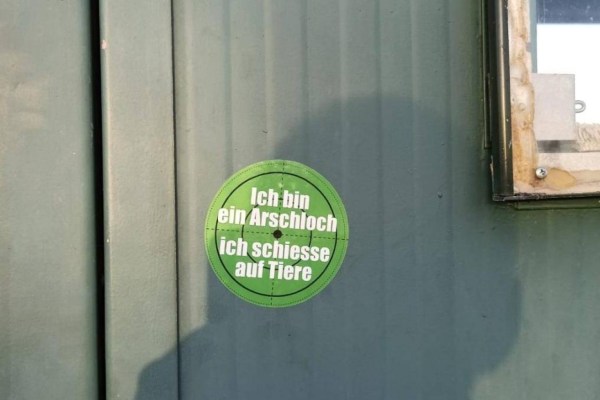 Criminal damage through stickers and graffiti